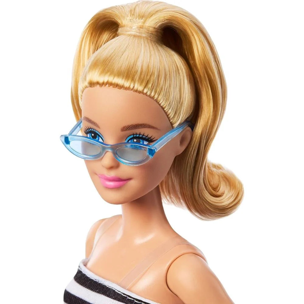 Papusa fashionista Barbie, aniversare de 65 de ani, in top alb-negru